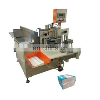 China Low cost serviette tissue paper packing machine for sale