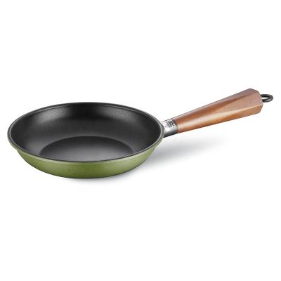 China Sustainable Carbon Steel Frying Pan With Wooden Handle And Black Non Stick Liner for sale