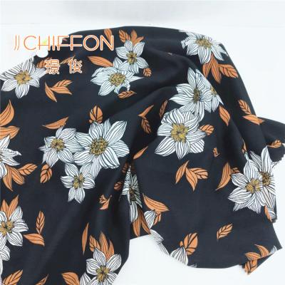 China HOT SELLING 75D 2400T 100%POLY FOAM BLACK WHITE FLOWER PRINT ANTI-STATIC CHIFFON LOW FABRIC FOR DRESS for sale