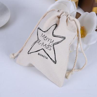 China Recycle/portable/fodable custom design fashion canvas cotton fabric organic drawstring bag with custom logo for sale