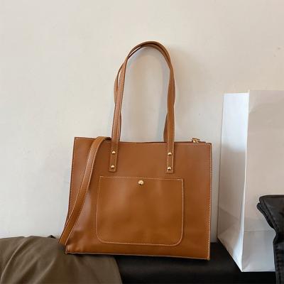 China EG550 Hot Selling Autumn And Winter Simple Portable Designer Tote Sling Bags Women'S Custom Casual Handbags For Ladies for sale