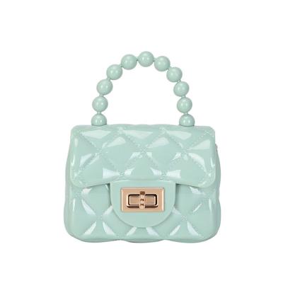 China Portable CL010 2021 Summer Mini Color Pearl Handle Fashion Rhombus Handbag PVC Shoulder Jelly Bag for sale