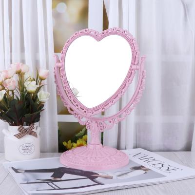 China Rotary Lighted Makeup Heart Shaped Mirror Holder Table Mirror Dresser for sale