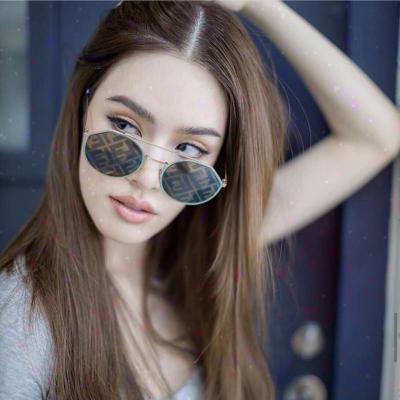 China Around the new text 2022 design coated sunglasses women fashion irregular sunglasses for sale