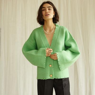 China women Pepa Anti-wrinkle Cardigan in soft polka dot green oversized knit with raw fringed knitwear edges and vintage gold style buttons for sale