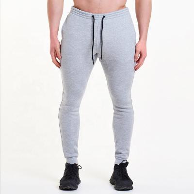 China Anti-Wrinkle Embroidery Logo Men Cotton Jogger Pants Sweatpants Slim Fit Joggers Gray Gym Joggers Men's Activewear for sale