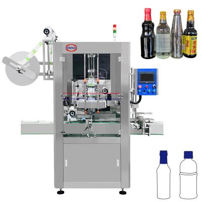 China CLOTHING Tamper Tape Applicator Visible Shrink Tape Sleeve Shrink Labeling Machine for sale