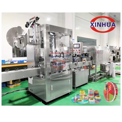 China Food Packaging Tape Packing Machine PVC Tape Shrink Wrap Machine for sale