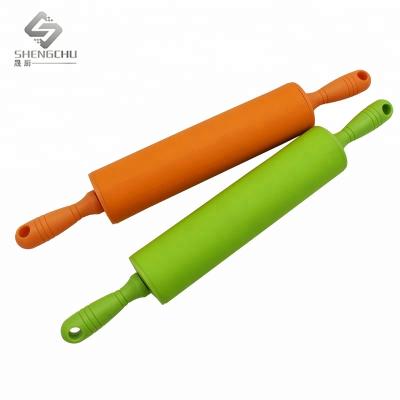 China Viable Christmas Plastic Handle Different Color Silicone Flour Rolling Pin Bakeware Custom Cake Tools For Baking Tools for sale