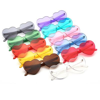 China 15 Years Experience Transparent One Piece Logo Oem Heart Shades Sunglasses With Candy Color Lens for sale