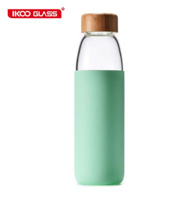 China Bpa Free Sustainable Bamboo Lid High Borosilicate Glass Water Bottle For Water for sale