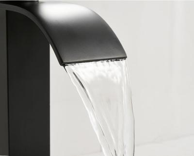 China Modern Bathroom Cabinet Toilet Above Counter Basin Black Waterfall Faucet Simple And Elegant for sale