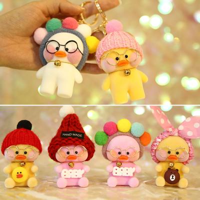 China Creative Cute Yellow Central Statistical Institute 12cm Cute Duck Small Plush Key Chain Toys For Car Key Bag Decoration for sale