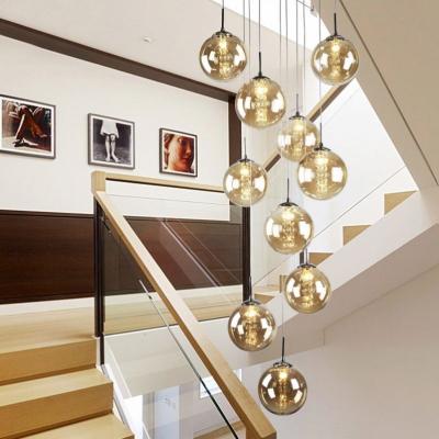 China Villa Residential Italian Globe Glass Stairs Pendant Hanging Lamps Long Light Spiral Spiral Staircase Modern Crystal Chandelier Lamps for sale