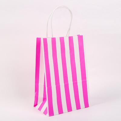 China Recycled Materials Shape White Vertical Stripe Kraft Paper Clothing Shopping Bags With Handle Food Kraft Paper Bag for sale