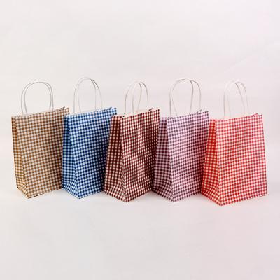 China Recycled Materials Wholesale Kraft Paper Bag For Custom Lattice Clothing Tea Brown Paper Shopping Bags With Handle for sale