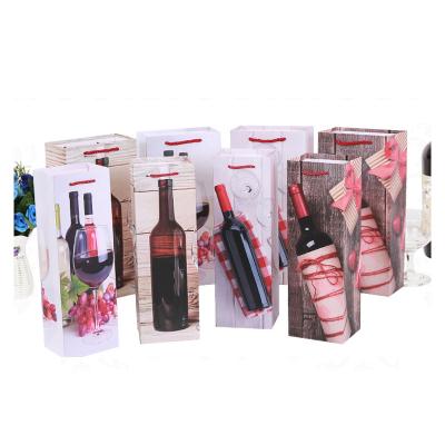 China Recycled Materials Fashion White Board Paper Wine Bottle Customized Luxury Bottle Christmas Gift Bags For Party for sale