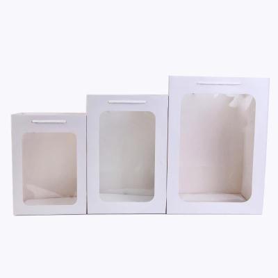 China Recycled Materials Flower Festival Transparent Candy Bag Wedding Gift Handbags Bouquet Packaging Box Box Wedding Paper Favors for sale