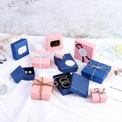 China Custom Kraft Box Packaging Logo Printed Cardboard Black Jewelry Jewelery Packaging Square Necklace and Earing Packaging Box with Storage for sale