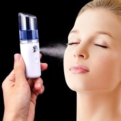 China Skin Rejuvenation Nano Spray Water Meter Sprayer Face Steamer Face Steamer Handheld Instrument for sale