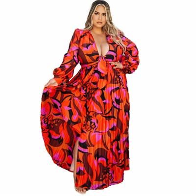 China Hot Sale QUICK DRY Women's Clothing Long Sleeve V Neck Blouse Pleated Long Skirt Suit Printed Two Piece Set for sale