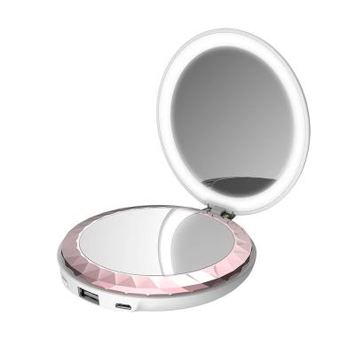 China New mini size portable multifunctional hand treasure deputy team leader makeup three heating mirror in one hand heating treasure for sale