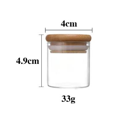 China Wholesale Custom Microwavable Glass Jar Stash 40ml Bamboo Lid 4 Sizes For Storage Tobacco And Spice for sale