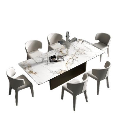 China Customized Luxury Table Minimalist Chipboard Stone Top Rectangle Minimalism Stainless Steel Modern Designer Dining Table for sale