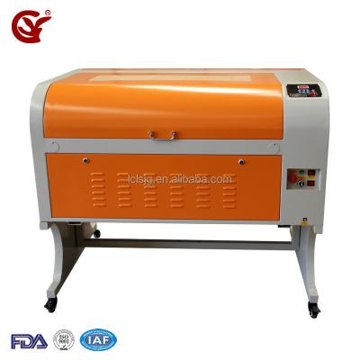 China Laser Engraving Coconut Shell Laser Cutter Machine 9060 Laser Cutting Machine and Engraving and Engraving Laser Engraving and Cutting Machine for sale