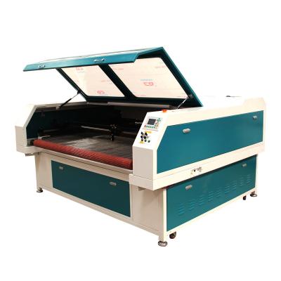 China Latest design automated textile garment cutter+mini fabric cutting machine top loading fabric for sale