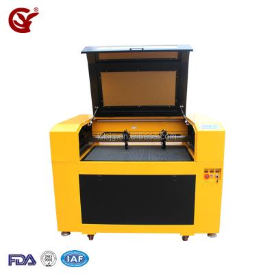 China Laser Engraving Hot Sale Acrlylic Used GY 690 CO2 1000dpi Laser Engraving And Cutting Machine for sale