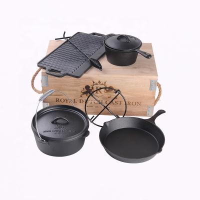 China Stron Oven Sauce Pot Fry Pan Dutch Oven Cooking Sets 7 Pcs Reversible Thai Cast Iron Dutch Reversible Side Part for sale