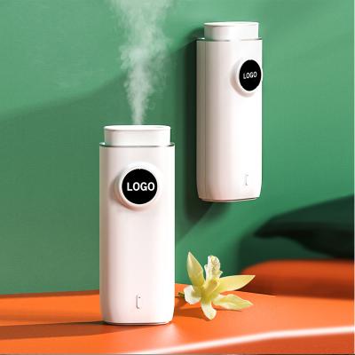 China ElectricHot Sale Air Scent Diffuser Waterless Scent Nebulizer Office Equipment Popular Household Wall Plug In Aroma Diffuser for sale