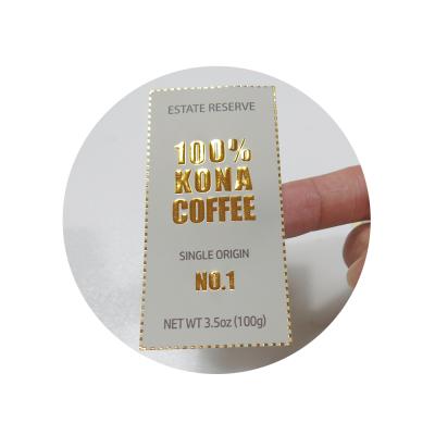 China Waterproof Bulk Custom Adhesive Peelable Beverage Packaging Paper Gold Foil Stamping Label Embossed Sticker for sale