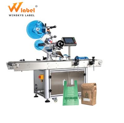 China Automatic Flat Commodities Label Applicator Machine For Plastic Bag Paper Pouch With Date Coder for sale