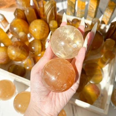 China Europe Natural Orange Optical Calcite Crystal Sphere Rainbow Honey Optical Calcite Sphere Calcite Ball Solar Plexus Chakra Healing for sale