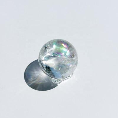 China Europe Natural Small Clear Quartz Crystal Sphere Rainbow Quartz Gemstone Sphere Small Crystal Ball Crown Chakra Healing for sale