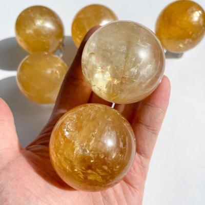 China Europe Natural Juicy Orange Optical Calcite Crystal Sphere Rainbow Honey Optical Calcite Sphere Calcite Ball Chakra Healing for sale