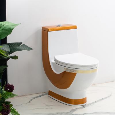 China Luxury Style Bathroom Middle East Automatic Operation Design WC Gold Plated One Piece Toilet Bowl for sale