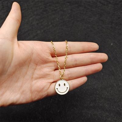 China TRENDY Fashion Creative Design 14K Inlaid Environmental Protection Face Sweater Chain Bone Copper Smile Pendant Chain for sale