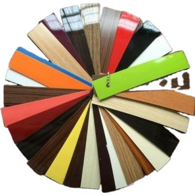 China Suitable for various furniture trims with wide range of patterns PVC dark edging solid color PVC edge trim strip for particle board for sale