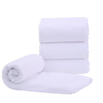 China Guangzhou Suppliers 70*140cm Dobby 600g Hotel Bath Towel Compressed White 100% Terry Cotton Towels for sale