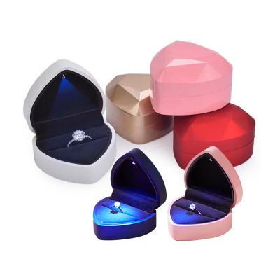 China Jewelry Display Packaging Baking Lacquer Creative Heart Shape Proposal LED Light Ring Pendant Jewelry Packaging Box for sale