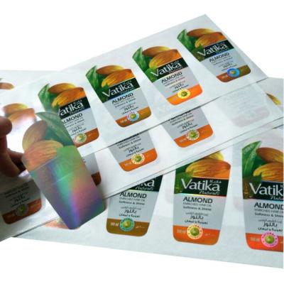 China Waterproof Custom Printed Waterproof Adhesive Label For Shampoo Bottle Cold Foil Clear Hair Oil Label Sticker for sale