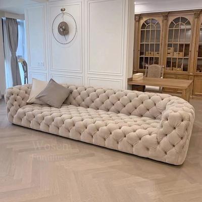 China Modern Soft Luxury Italian Tufted Gray Leather Moon Chesterfield Sofa for sale