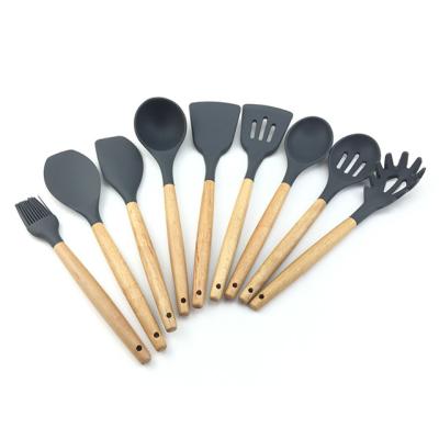 China Sustainable Kitchen Baking Utensils Wholesale Silicone Kitchen Utensils Set With Wooden Handle for sale