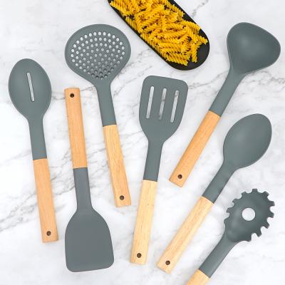 China Sustainable Wooden Handles Kitchen Utensils Set Cookware Blue Nylon Cooking Utensils for sale