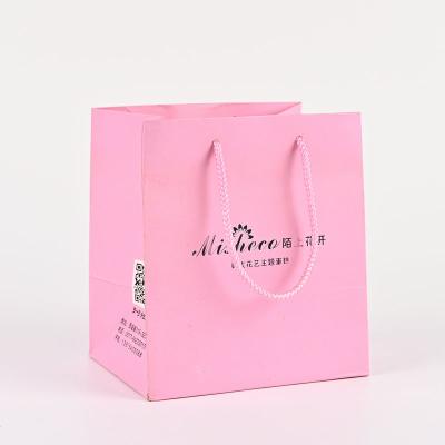 China Recyclable Fancy Pink Tote Bag With Silver Foil Debossed Store Name Cake Paper Bag Fashion Decoration Cartoon Paper Special Gift Bags New for sale