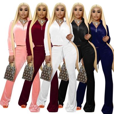 China Leisure comfort daily using leisure casual sweater solid color navel flared pants set clothes 2021 women suits for sale