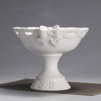 China Sustainable hot sale top class customized bowknot and lace design ceramic footed bowl or fruit bowls. for sale